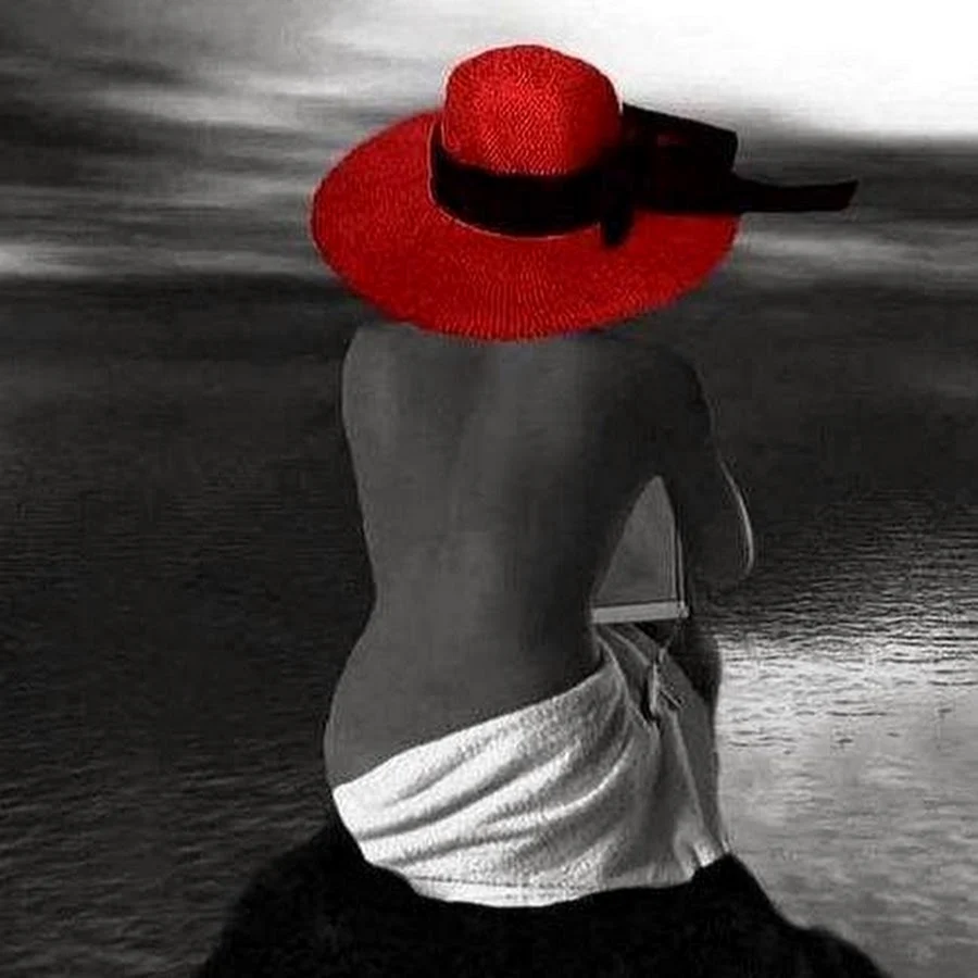 Black and White woman in Red hat