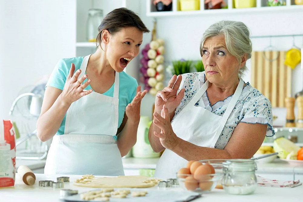Grandmother and daughter Cooking
